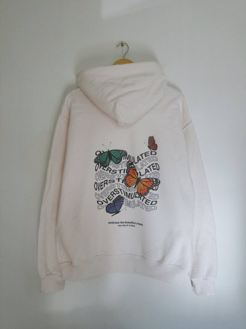 "Overstimulated" Cream Hoodie 🦋 T-Shirts, Sweatshirt | PodTeesHub.com