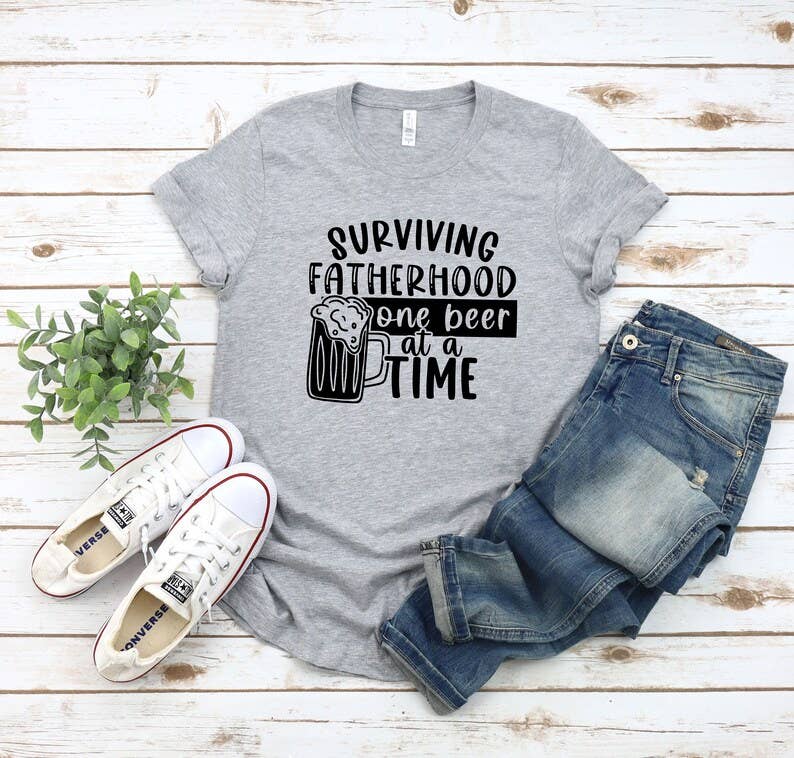 Surviving Fatherhood One Beer At A Time T-Shirt Hoodie, Sweatshirt | PodTeesHub.com