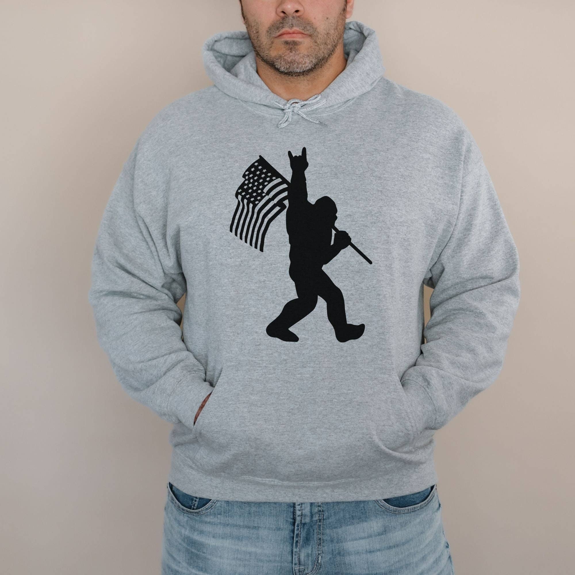 Patriotic Bigfoot American Flag Hoodie Unisex Fit T-Shirts, Sweatshirt | PodTeesHub.com
