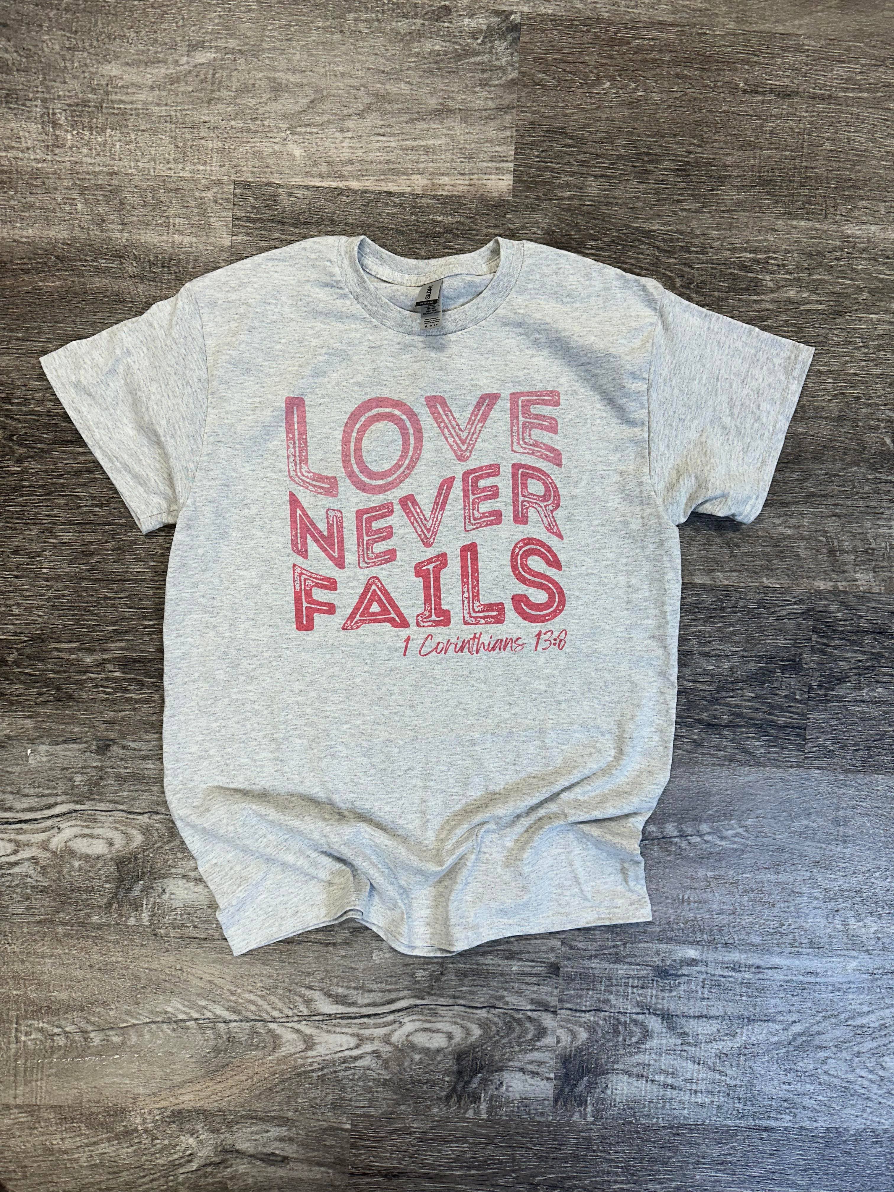 Love Never Fails - 1 Corinthians 13:8 - Ash Gray Tee Hoodie, Sweatshirt | PodTeesHub.com