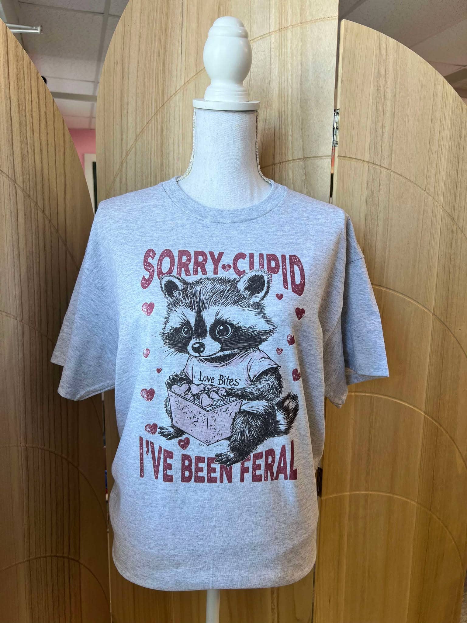 Sorry Cupid I've Been Feral Raccoon On Ash Gray Tee Hoodie, Sweatshirt | PodTeesHub.com