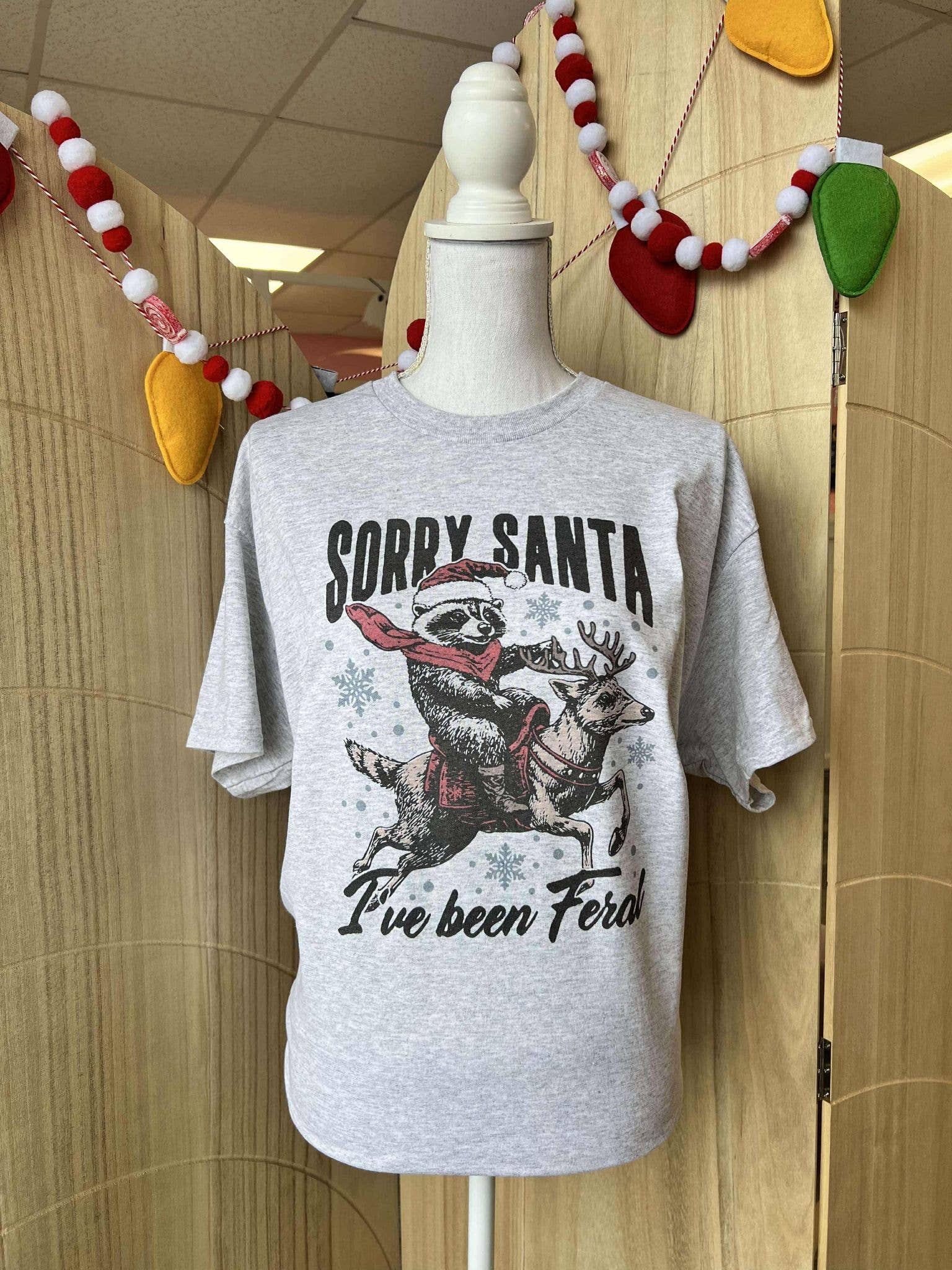 Sorry Santa I've Been Feral Raccoon On Ash Gray Tee Hoodie, Sweatshirt | PodTeesHub.com