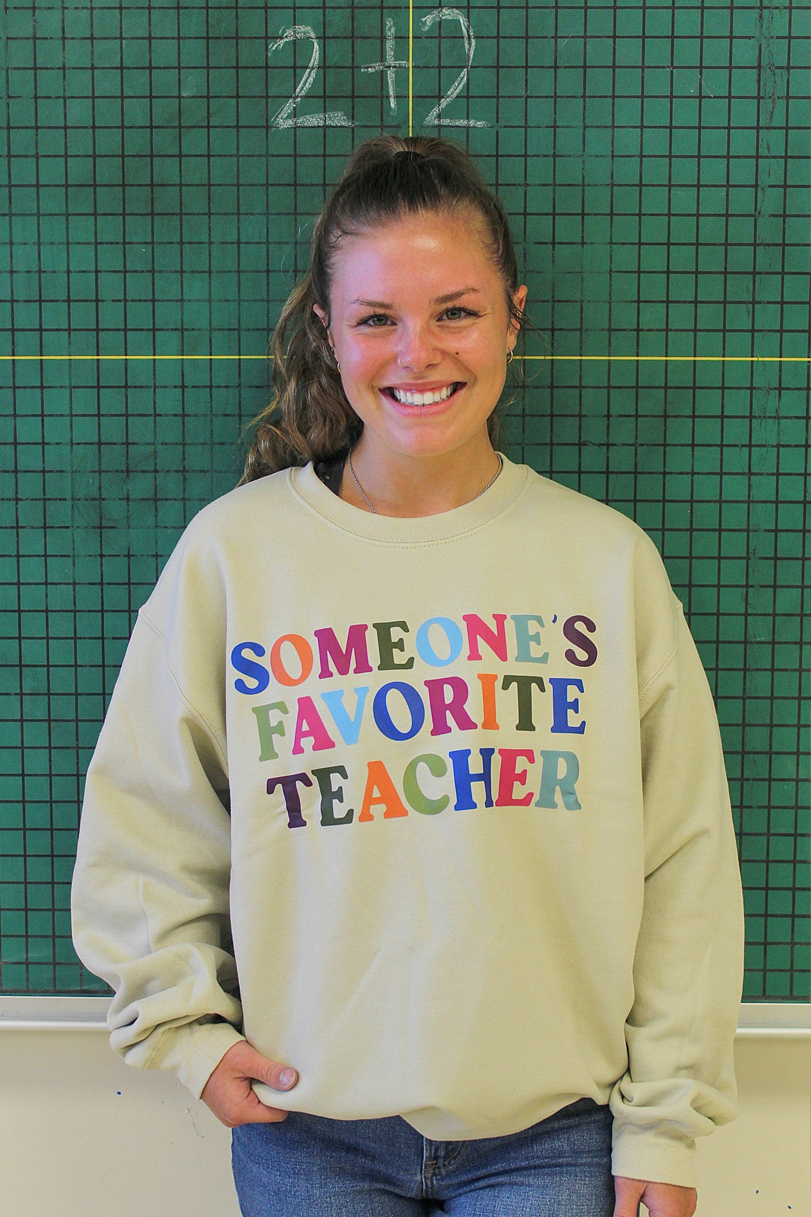Someone's Favorite Teacher Graphic Sweater T-Shirts, Hoodie, Sweatshirt | PodTeesHub.com