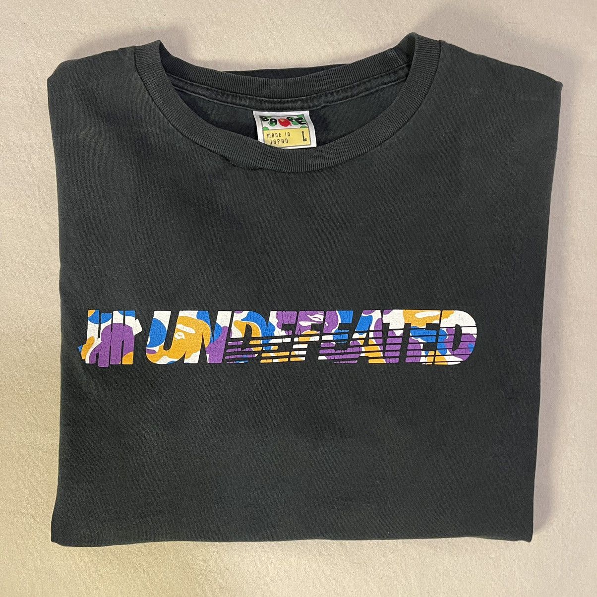 Bape X Undefeated Black Graphic Tee Hoodie, Sweatshirt | PodTeesHub.com