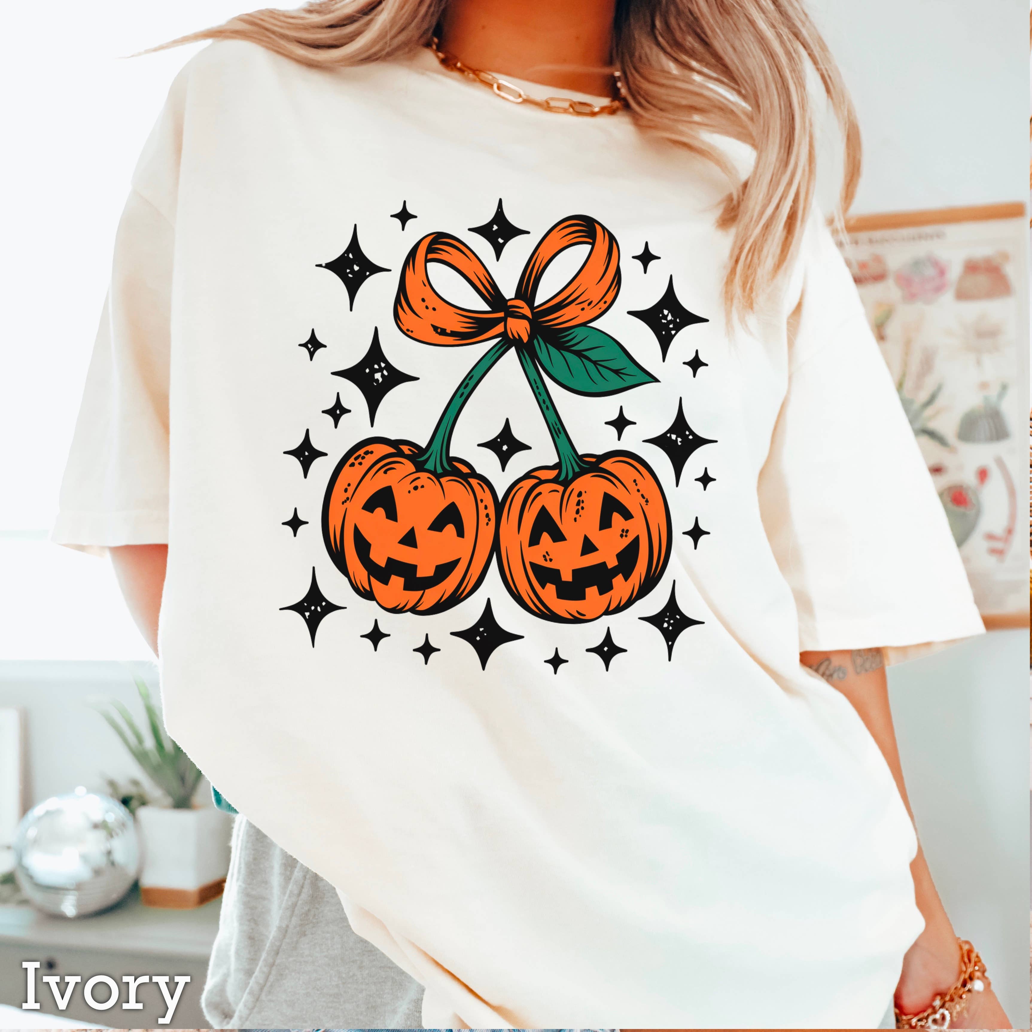 Halloween 2025  Pumpkins Bow Graphic Shirt | Comfort Color Hoodie, Sweatshirt | PodTeesHub.com