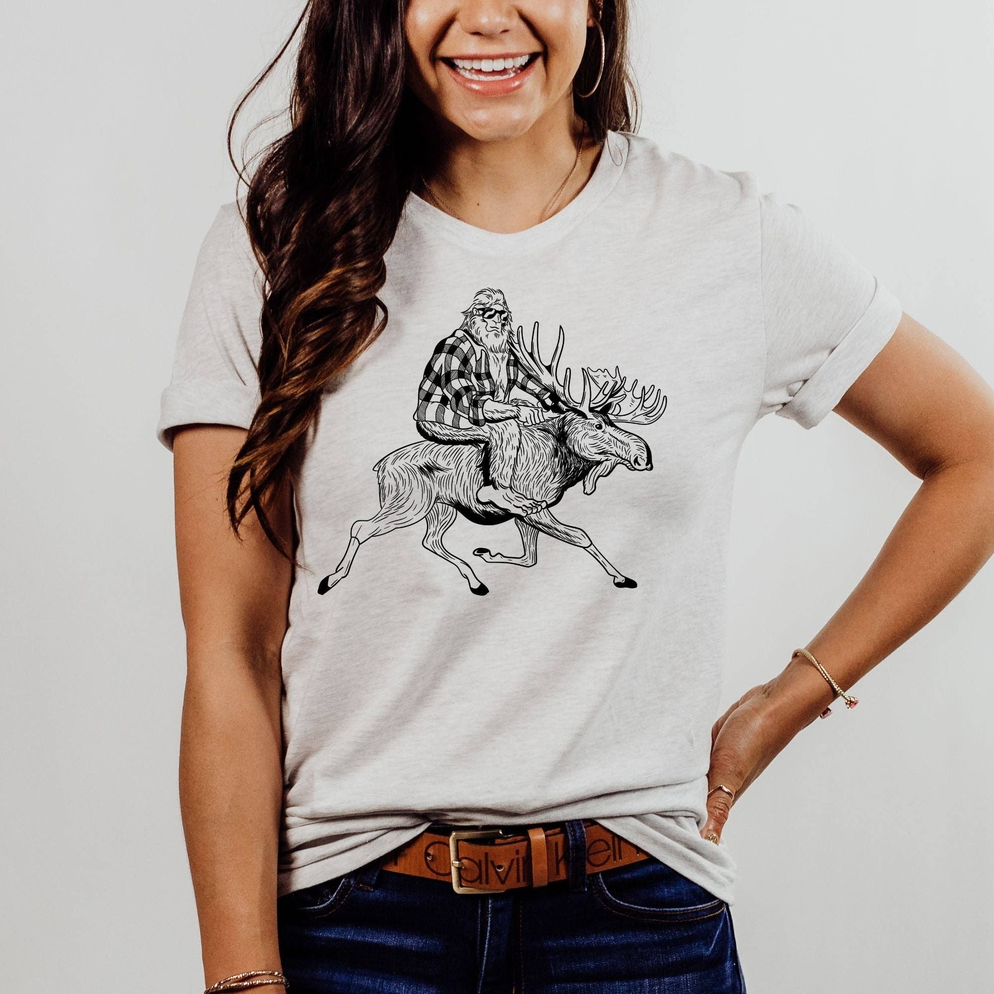 Bigfoot Riding A Moose Tshirt *Unisex Fit*213 Hoodie, Sweatshirt | PodTeesHub.com