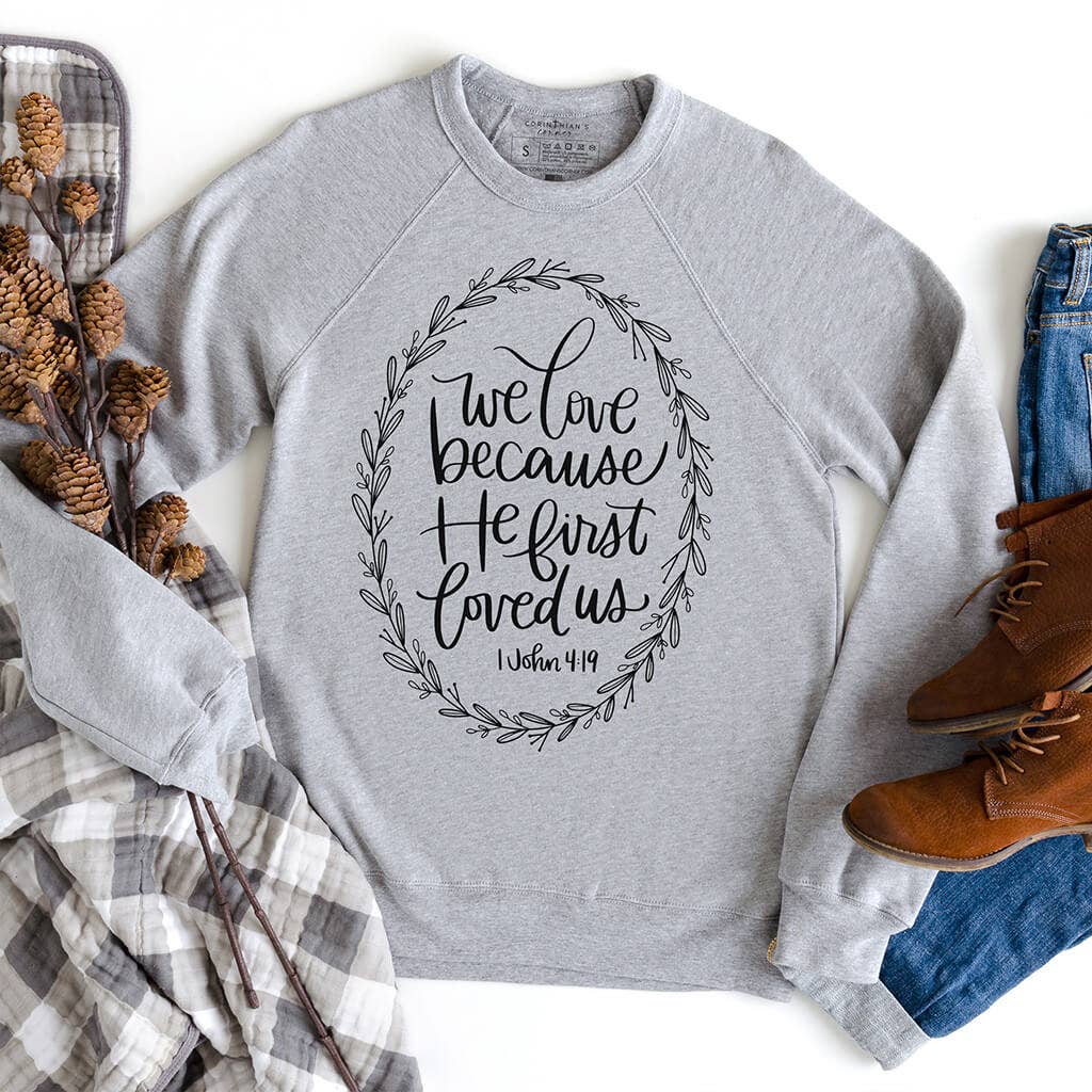 He First Loved Us Premium Fleece Sweatshirt T-Shirts, Hoodie | PodTeesHub.com
