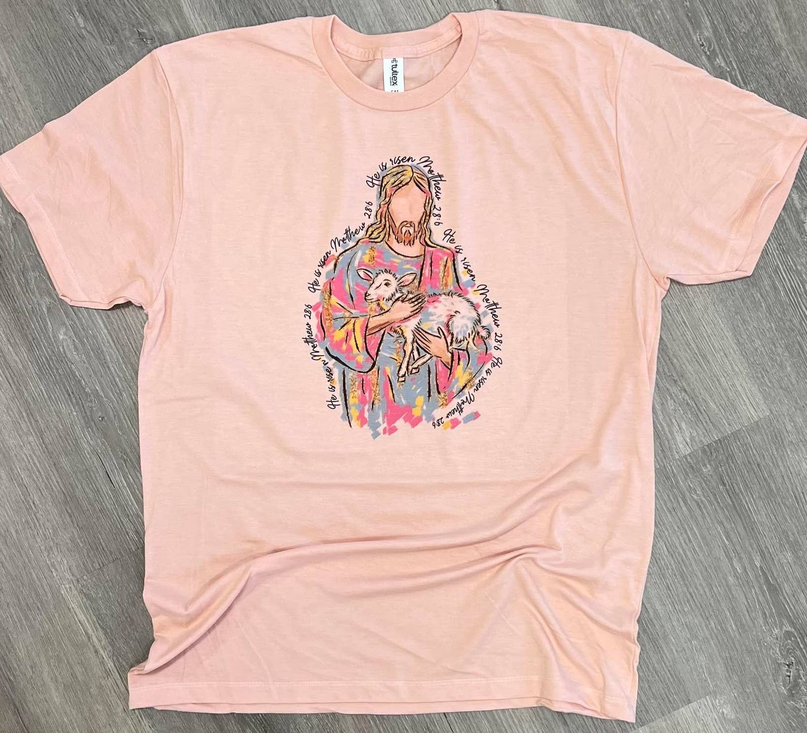 Brushstroke Jesus with Lamb He Is Risen On Peach Tee Hoodie, Sweatshirt | PodTeesHub.com