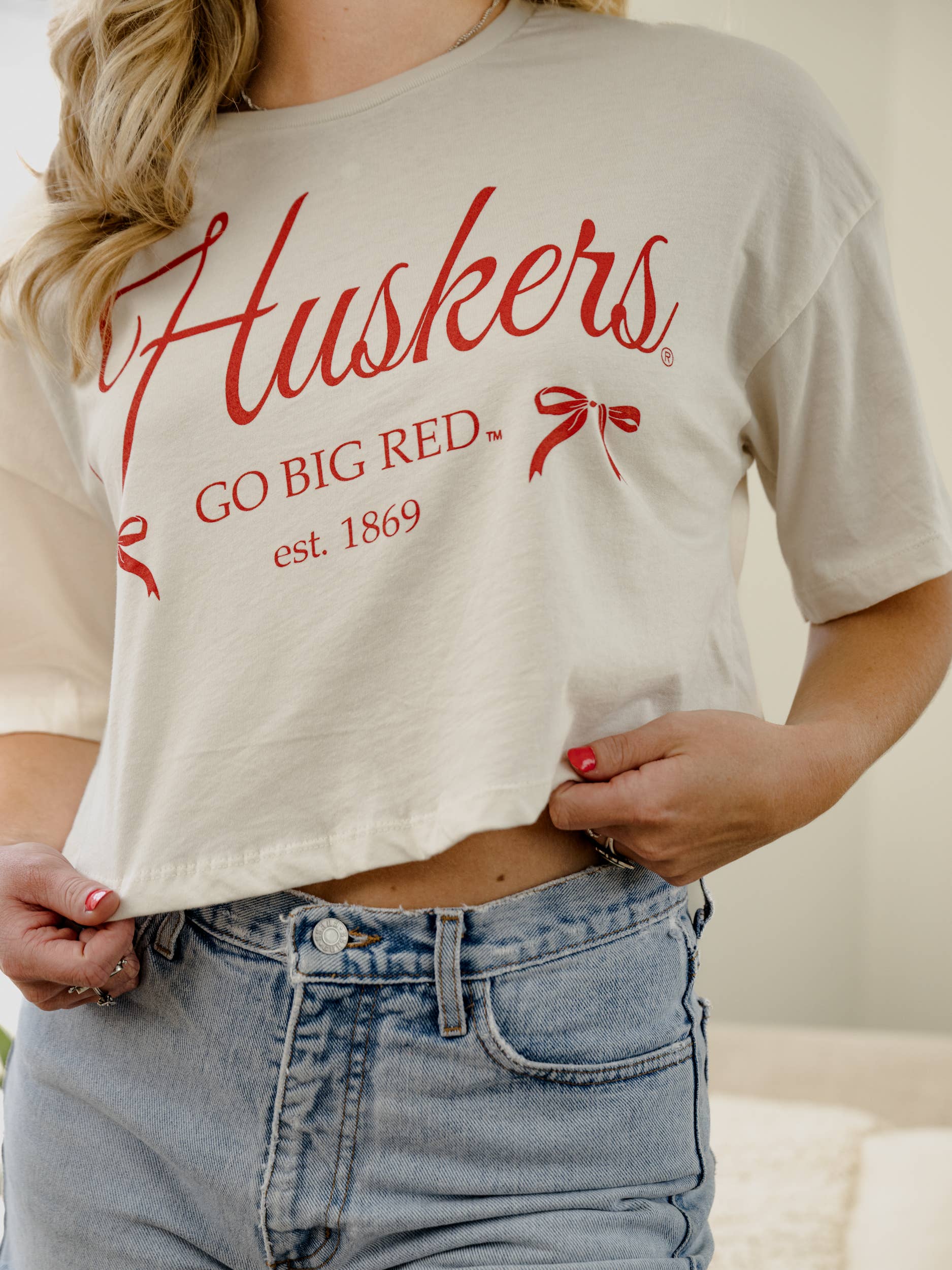 Nebraska Huskers Established Bows Off White Cropped Tee Hoodie, Sweatshirt | PodTeesHub.com