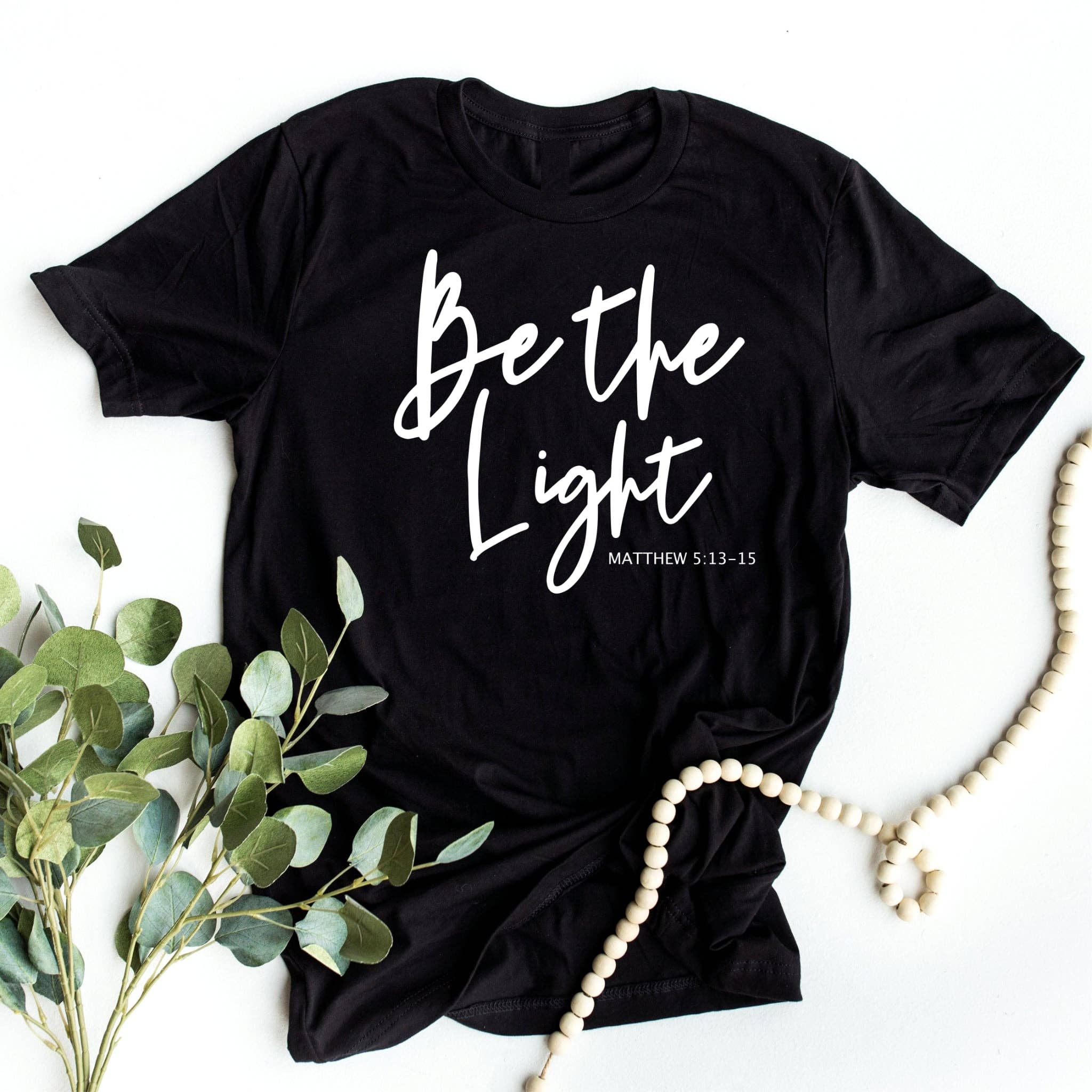 Christian Be the Light Black Bella Graphic Tee Free Shipping Hoodie, Sweatshirt | PodTeesHub.com