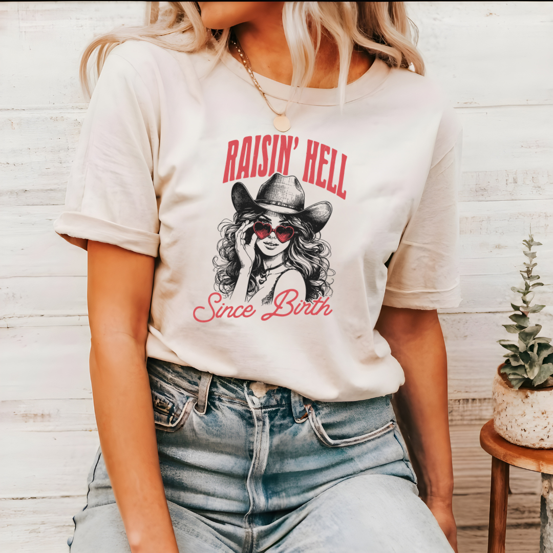 Raising Hell Since Birth Graphic Tee – Western Attitude Hoodie, Sweatshirt | PodTeesHub.com
