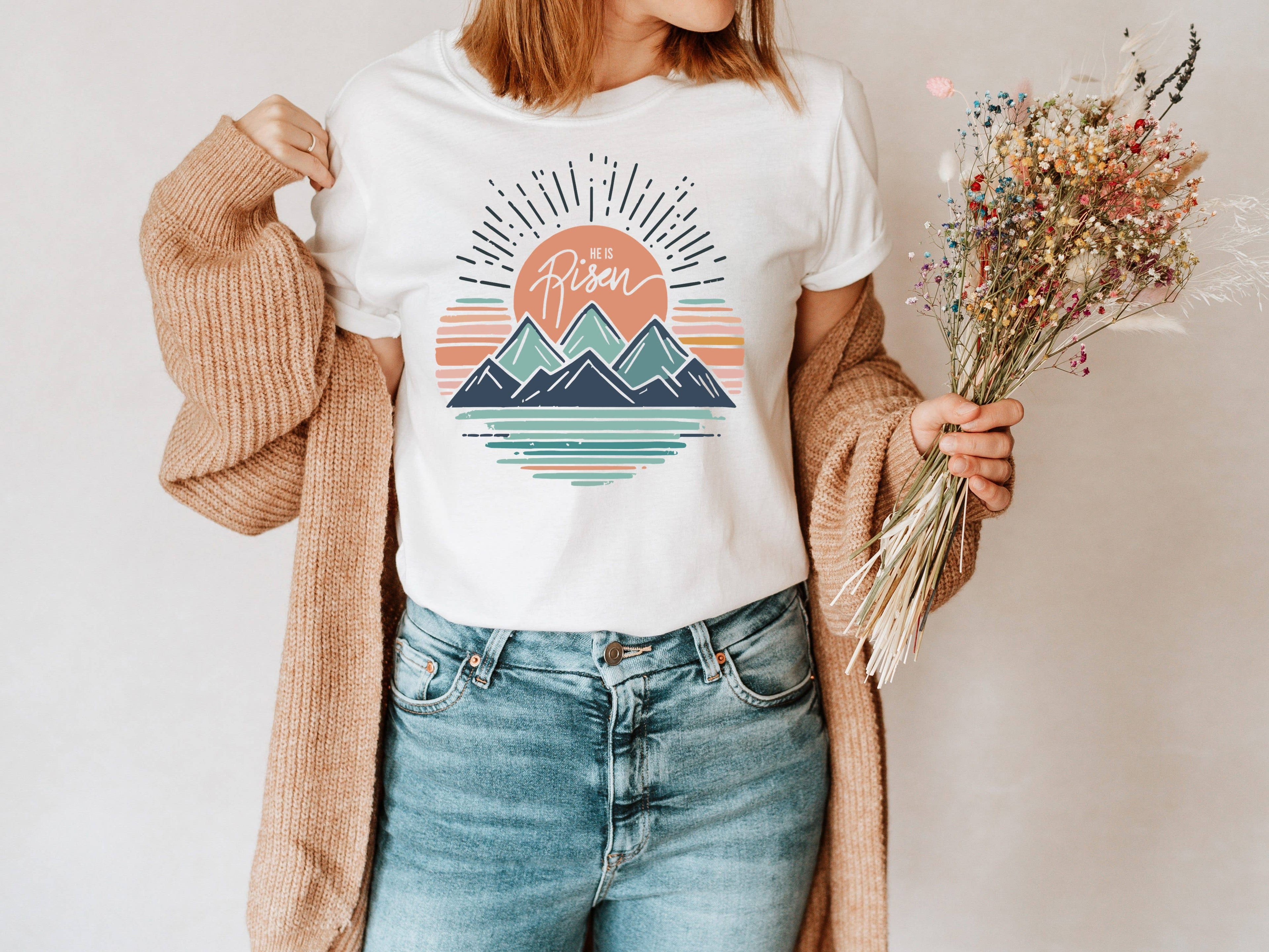 He Is Risen Mountains Easter Graphic Tee | Women's Tees Hoodie, Sweatshirt | PodTeesHub.com