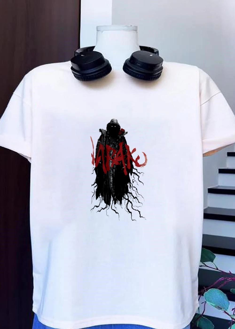 Dark Fantasy Shadow Figure Appears on K R A K E Apparel T-Shirt