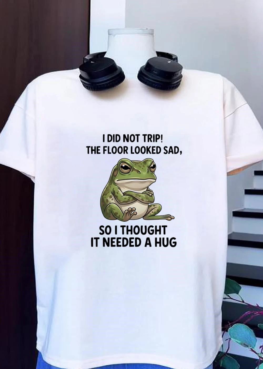 I did not trip the floor looked sad so I thought it needed a hug frog shirt