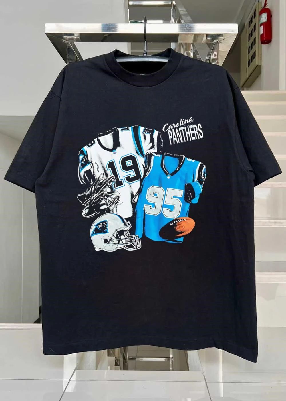 Nutmeg Carolina Panthers Featuring Numbered Jerseys and Helmet Shirt