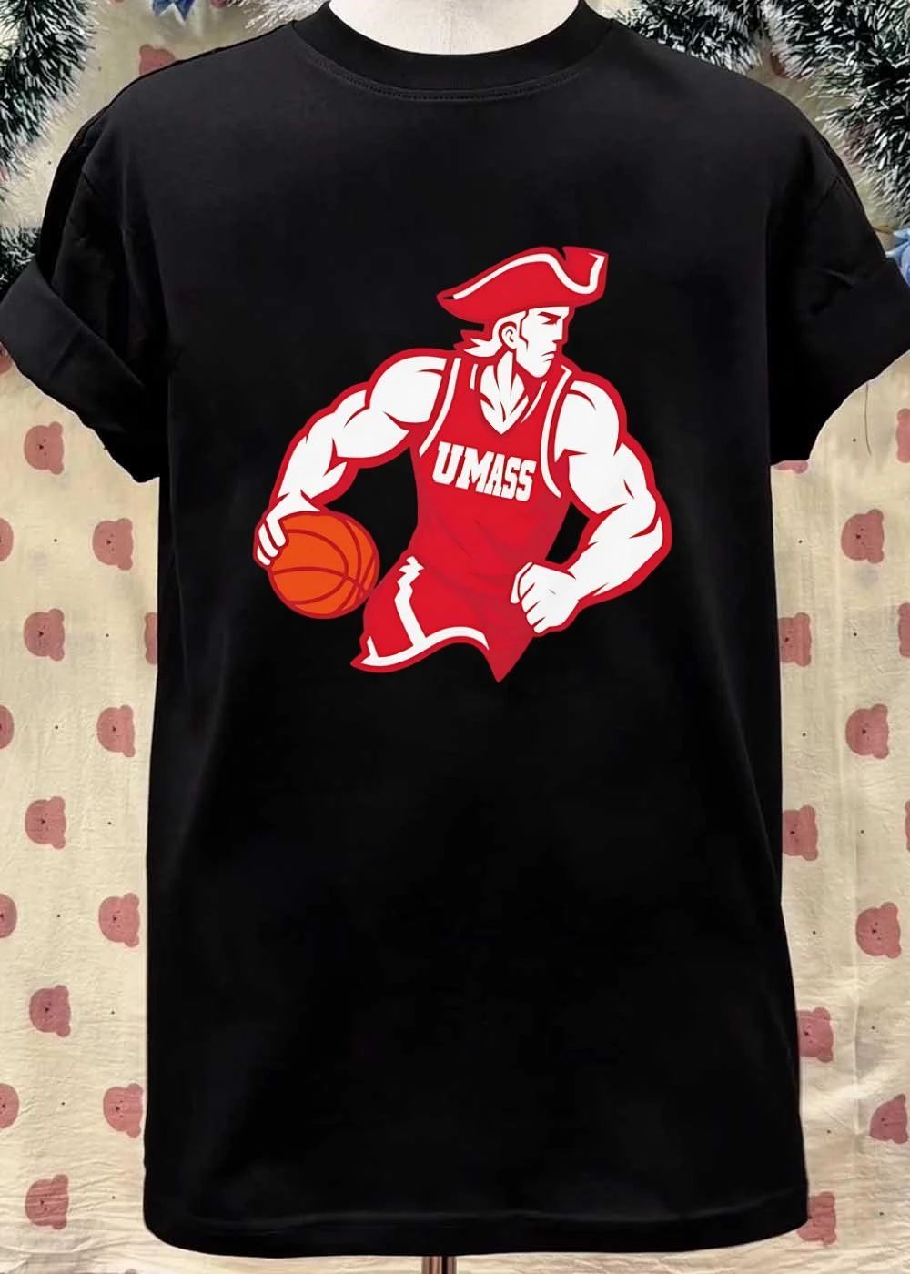 Minuteman Dribbling Ball UMass shirt