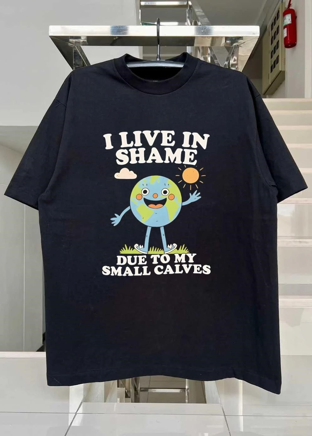 Funny Earth Character Illustration I Live in Shame Due to My Small Calves T-Shirt