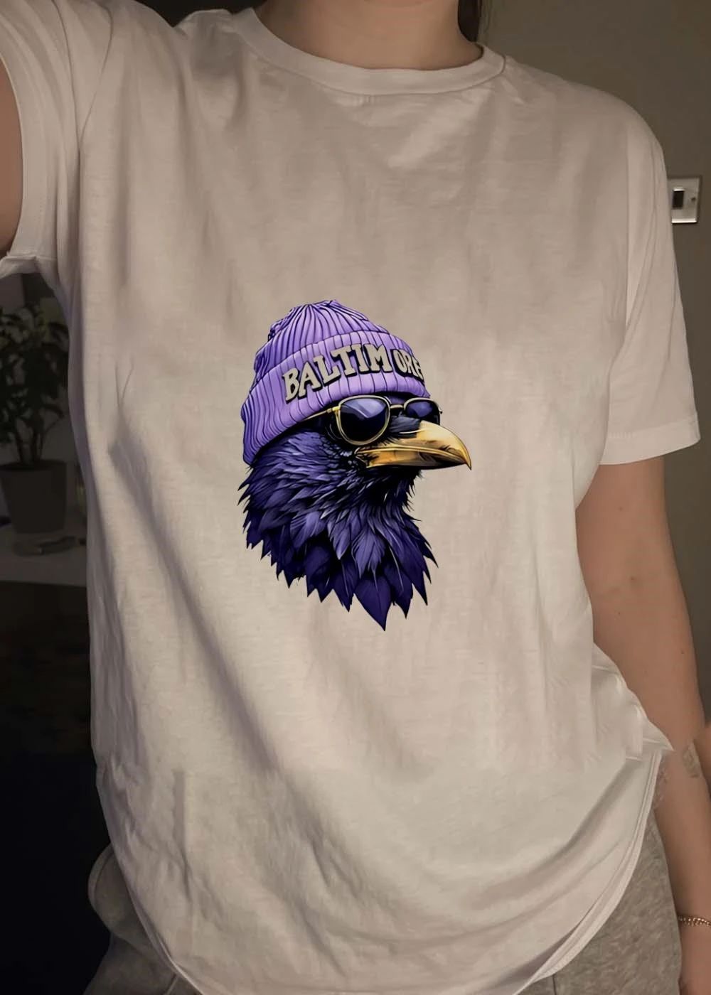 Cool Bird Gear Stylish Baltimore Raven Wearing a Beanie T-Shirt