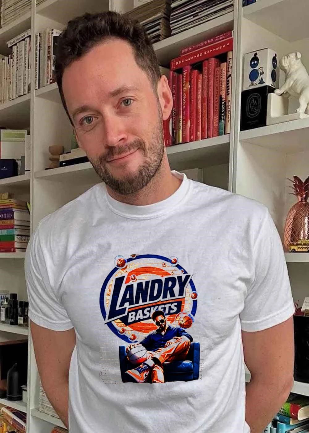 Landry Baskets Stylish Man Sitting with Basketball Graphic T-Shirt